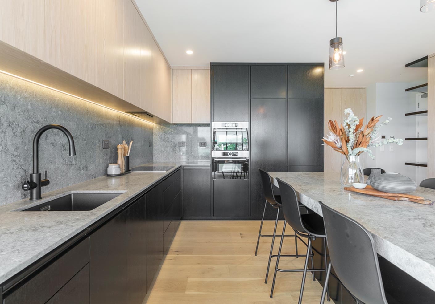 Minimalist-Kitchen-Paired-with-Warming-TimberTones